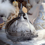 Traditional Kazakh metal warrior helmet with chainmail and ornate saukele bridal headdresses with pearl decorations